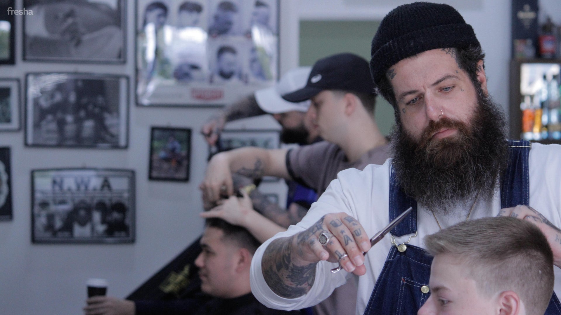 Barber at work — precision cutting with scissors